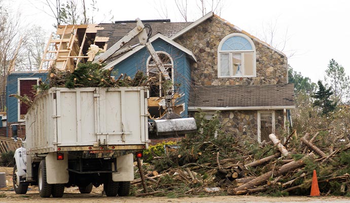 Storm damage cleanup with truck