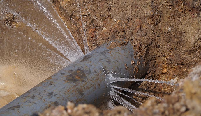 Water leaking from broken pipe Water leaking from broken pipe