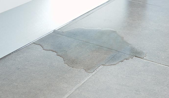 Water spill on tile floor