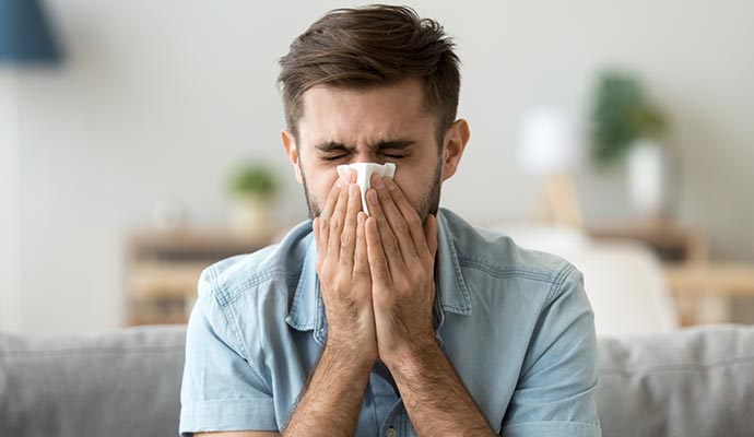 A person sneezing