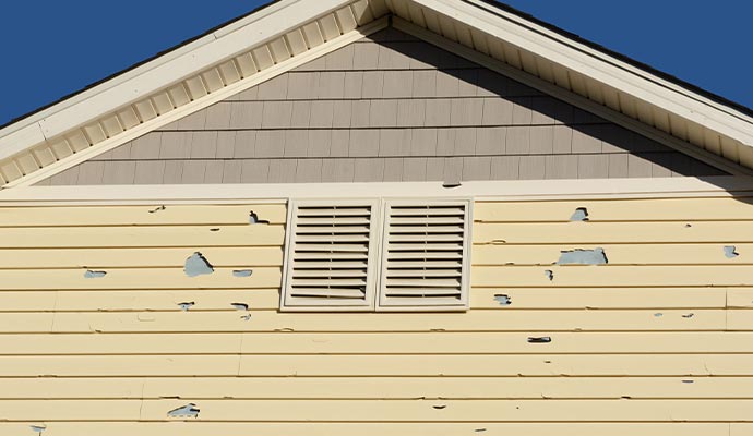 Hail damaged house