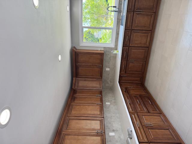 An initial view of the kitchen, the area affected by the water leak under the sink. Our water damage restoration team conducted a full assessment to inspect behind the cabinets and surrounding materials for hidden moisture, planning the water mitigation and mold prevention strategy.