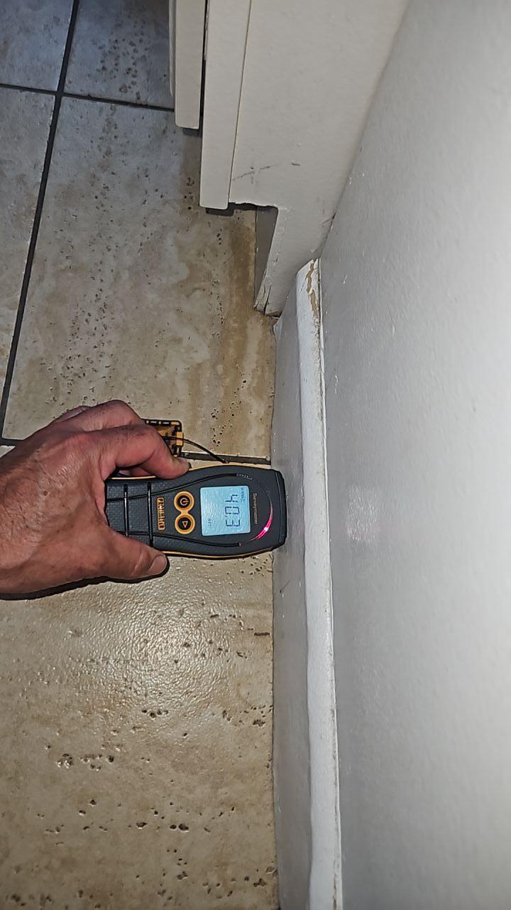 Moisture testing after main sewer line clog repair and water damage reconstruction. dkirestotech ensures complete drying and structural integrity restoration following major plumbing issues.