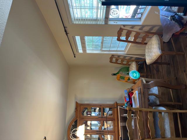 Completed fire damage restoration of a dining room area, including smoke and soot residue cleaning from walls and ceilings, and odor removal service for a clean, safe property.