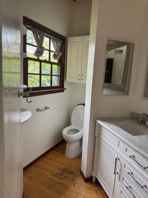 Completed smoke damage restoration in a bathroom, showing successful soot cleanup on walls and fixtures, along with full odor removal to restore the property's air quality.
