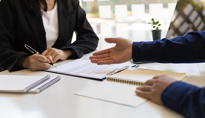 Insurance adjuster dealing with client